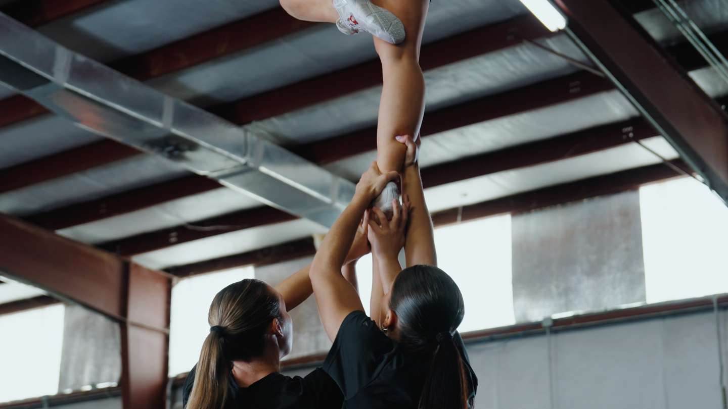 All girl cheerleading stunt group